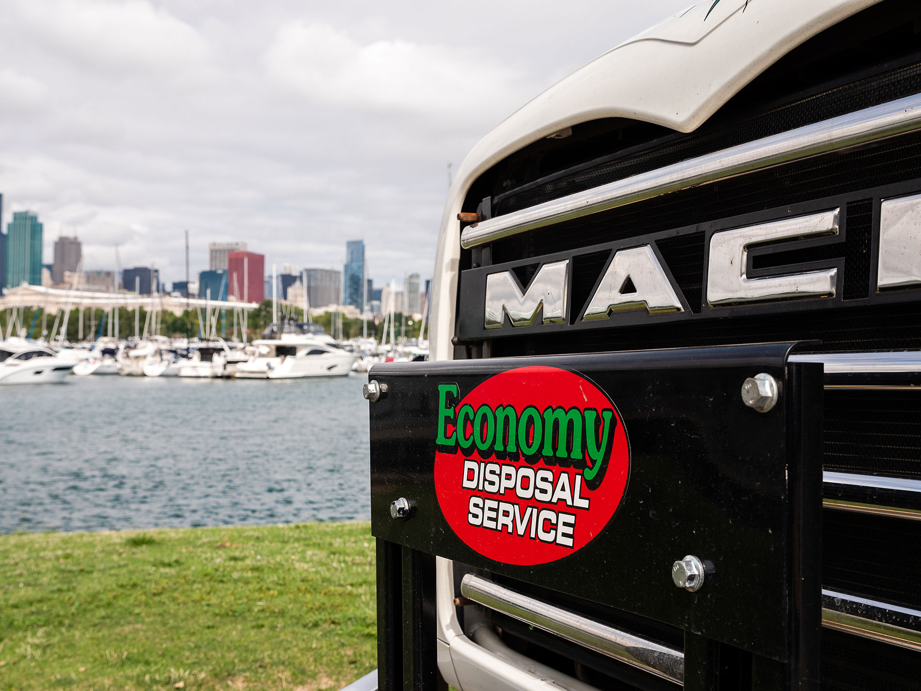 Close up of Economy Disposal Service Truck